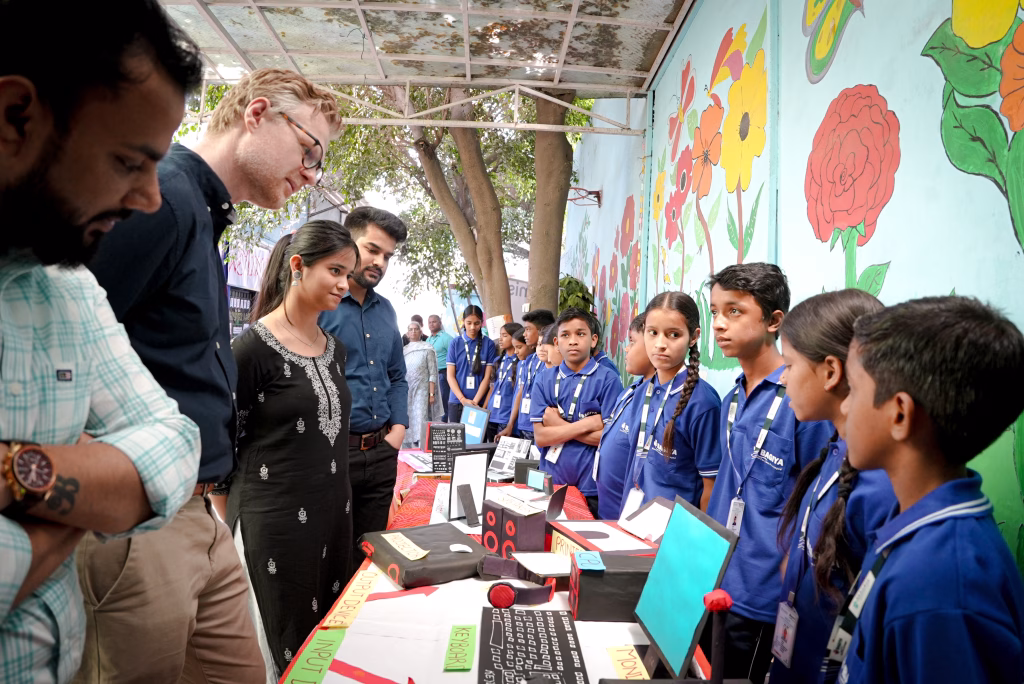 The children showing the Atomise team their work which accurately explained a varied range of computing and networking concepts